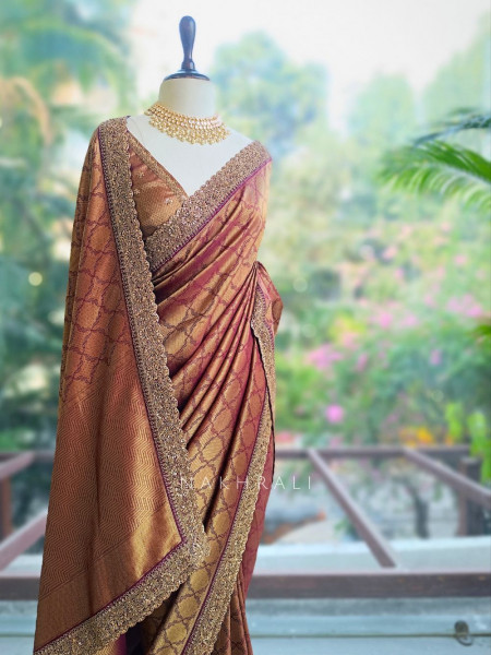 Shwetambari Wine Silk Saree with Zari Woven Pattern