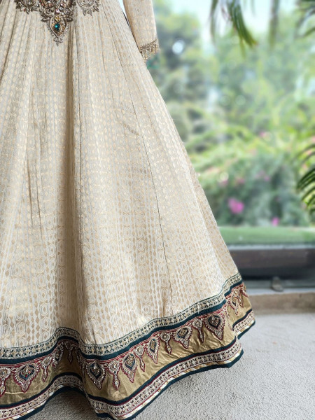 Ratna Cream Banarasi Silk Anarkali Suit Set with Green Border & Zardozi Mirror Work