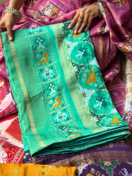 Kalyani Plum Rama Patola Saree With With Running Blouse Piece
