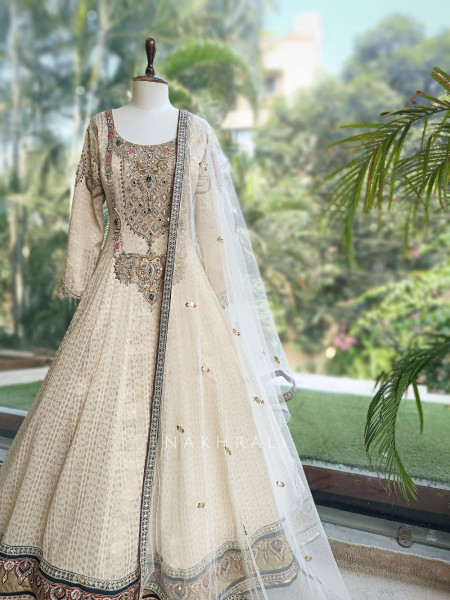 Ratna Cream Banarasi Silk Anarkali Suit Set with Green Border & Zardozi Mirror Work