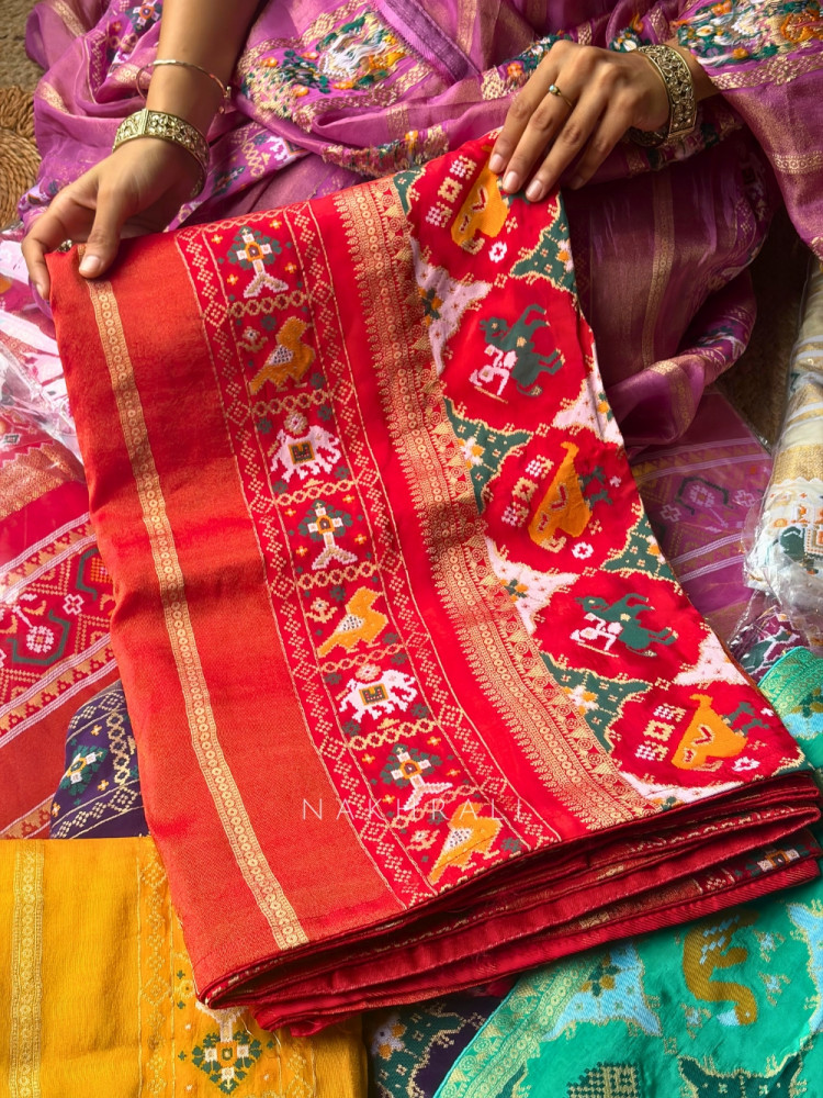 Image of Kalyani Plum Red Patola Saree With With Running Blouse Piece