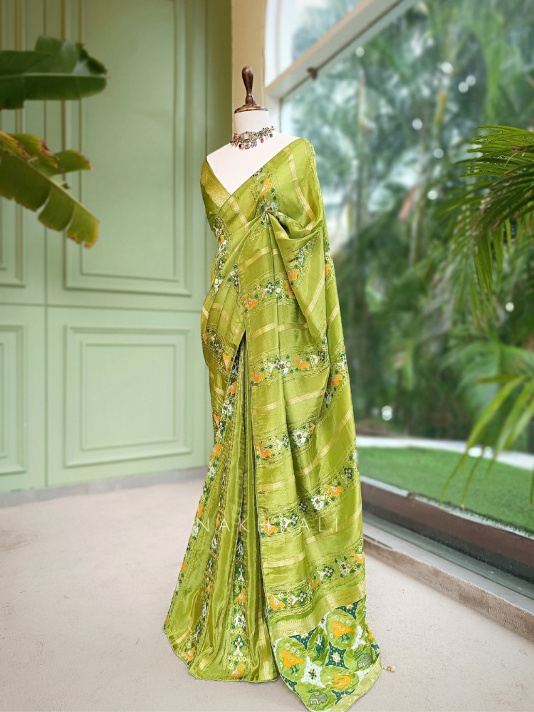 Image of Kalyani Plum Green Patola Saree With With Running Blouse Piece