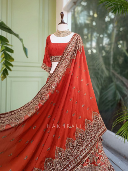 Vrishti Brick Lehenga Set with Peacock and Sequin Embroidery