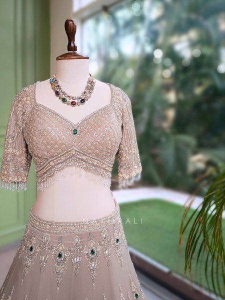 Frost Grey Satin Lehenga With Zardozi, Cutdana & Emerald Kundan Work