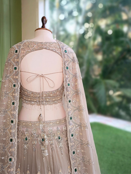 Frost Grey Satin Lehenga With Zardozi, Cutdana & Emerald Kundan Work