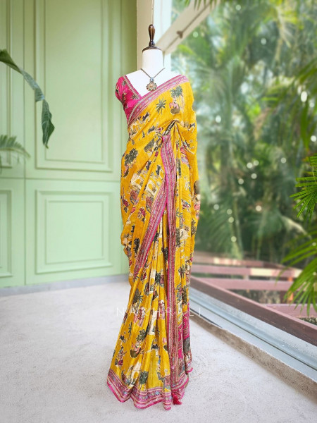 Nerix Mustard Printed Saree with Scenic Motif Border