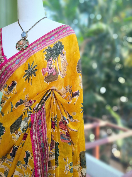 Nerix Mustard Printed Saree with Scenic Motif Border