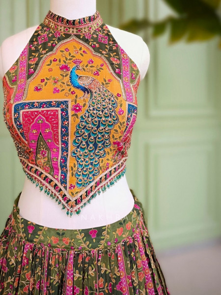 Gulnaar-e-Ishq Mehendi Green Peacock Print Halter Neck Lehenga Set