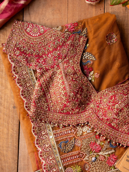 Rangmahal Rustic Orange Net Saree with Embroidered Blouse