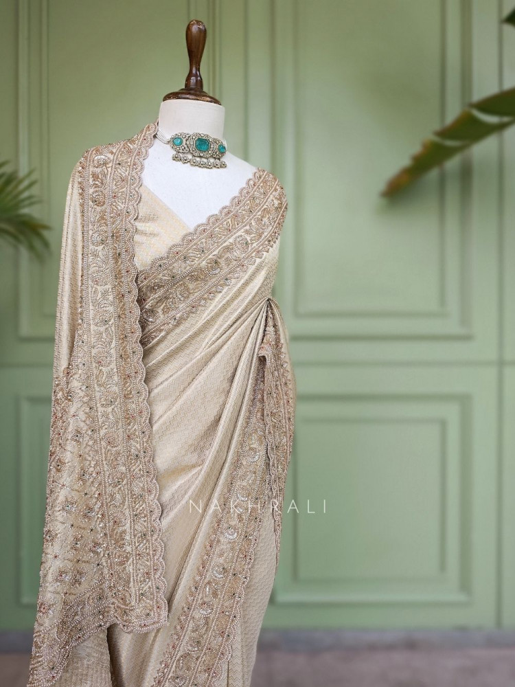 Image of Kasturi Cream Zari Saree with Cut Dana Beads Work