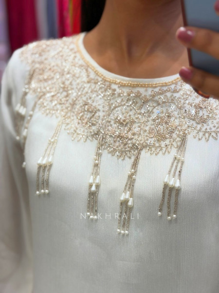 Tirva White Silk Kurta Palazzo Set with Cut Dana Work
