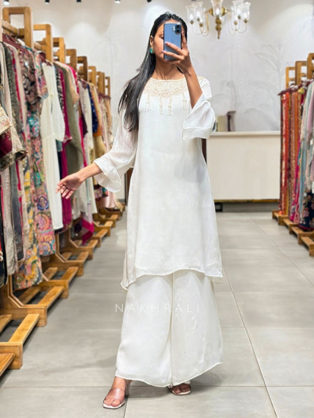 Tirva White Silk Kurta Palazzo Set with Cut Dana Work