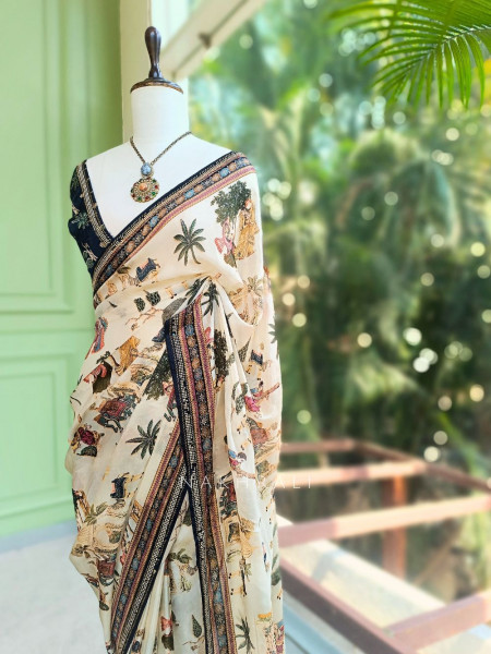 Nerix Black Printed Saree with Scenic Motif Border