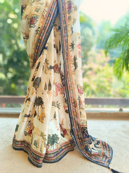 Nerix Black Printed Saree with Scenic Motif Border