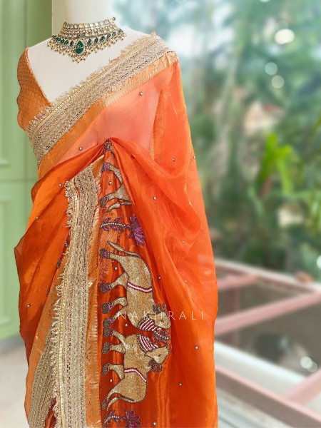Vraj Ras Orange Banarasi Tissue Silk Saree – Hand Embroidery & Zari Border
