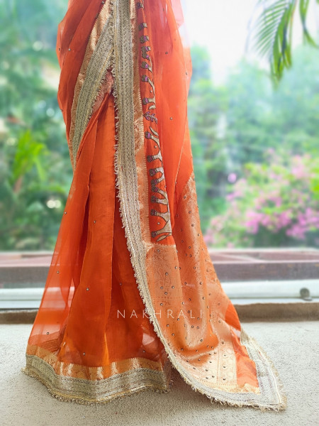 Vraj Ras Orange Banarasi Tissue Silk Saree – Hand Embroidery & Zari Border