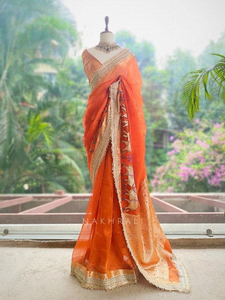 Vraj Ras Orange Banarasi Tissue Silk Saree – Hand Embroidery & Zari Border
