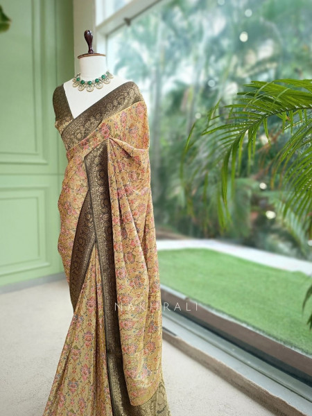 Pushkalini Pista Green Banarasi Georgette Saree