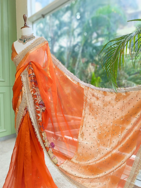Vraj Ras Orange Banarasi Tissue Silk Saree – Hand Embroidery & Zari Border