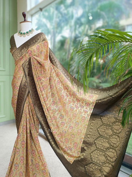 Pushkalini Pista Green Banarasi Georgette Saree