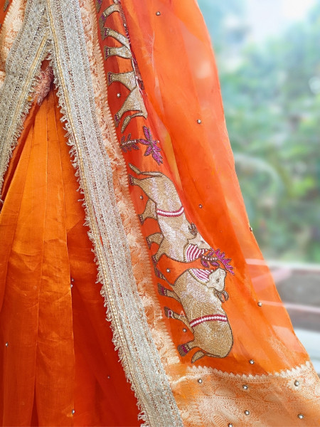 Vraj Ras Orange Banarasi Tissue Silk Saree – Hand Embroidery & Zari Border