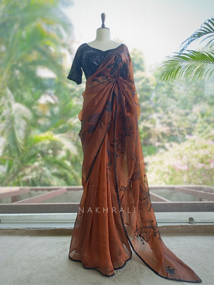 Image of Glittering Brown Organza Silk Saree with Abstract Floral Peacock Cutdana Work