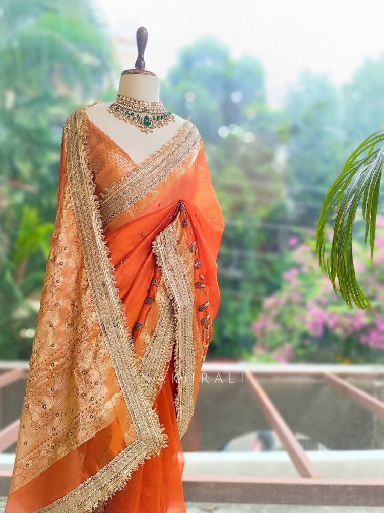Image of Vraj Ras Orange Banarasi Tissue Silk Saree – Hand Embroidery &amp; Zari Border