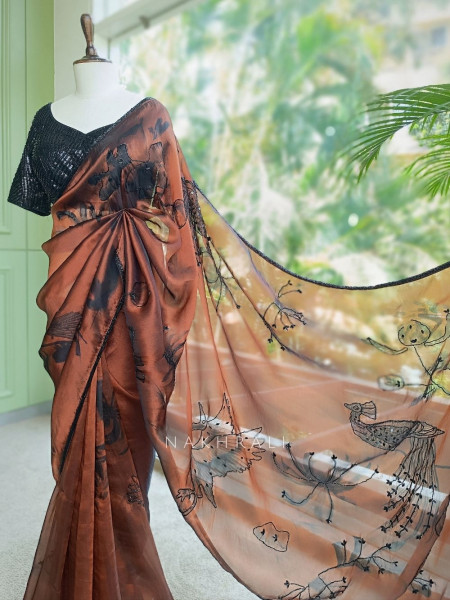 Glittering Brown Organza Silk Saree with Abstract Floral Peacock Cutdana Work