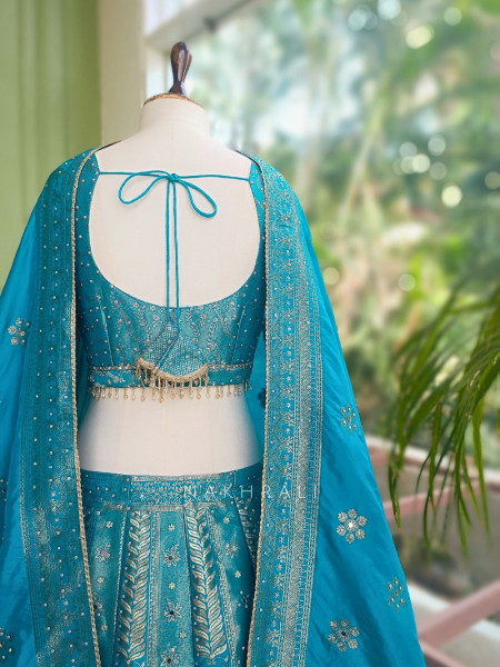 Mrigesha Rama Banarasi Silk Lehenga Set With Mirror Cutdana Work