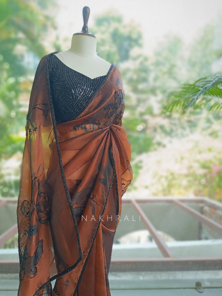 Glittering Brown Organza Silk Saree with Abstract Floral Peacock Cutdana Work