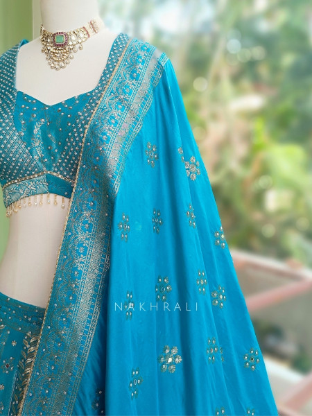 Mrigesha Rama Banarasi Silk Lehenga Set With Mirror Cutdana Work