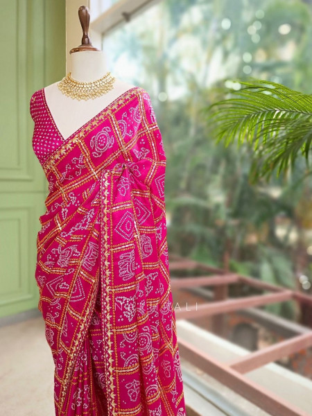 Rangsheesh Magenta Bandhani Saree with Heritage Border