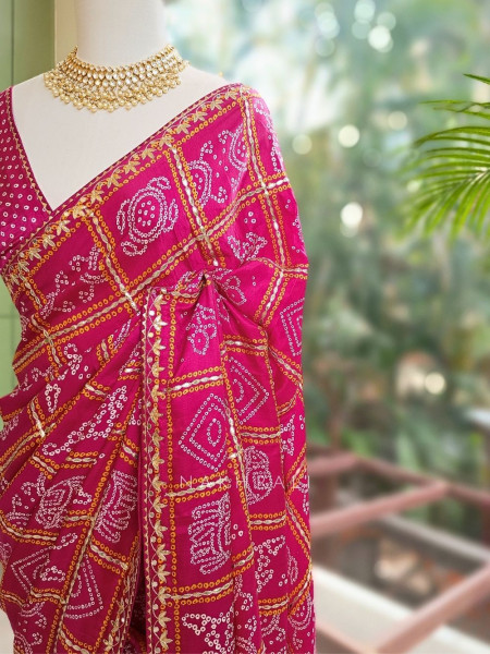 Rangsheesh Magenta Bandhani Saree with Heritage Border