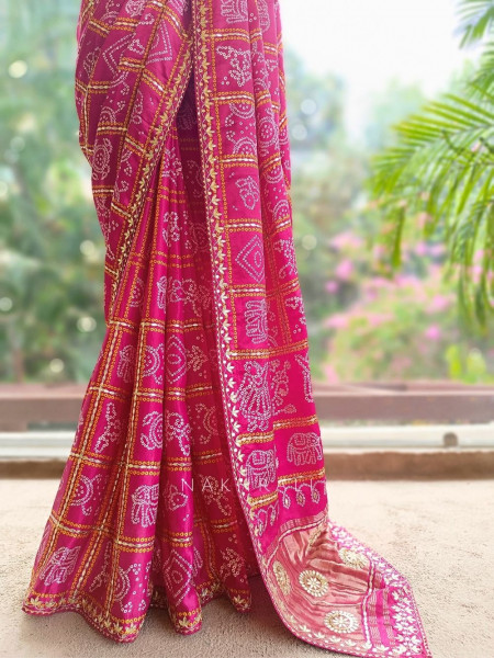 Rangsheesh Magenta Bandhani Saree with Heritage Border