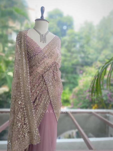 Tarangini Light Purple Net Saree With Cutdana and Sequin Work