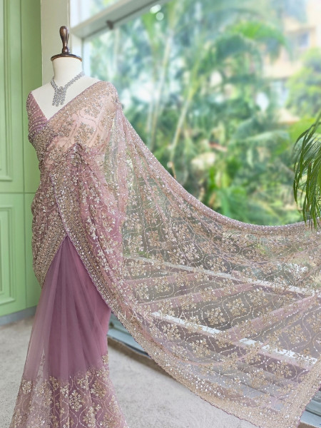 Tarangini Light Purple Net Saree With Cutdana and Sequin Work