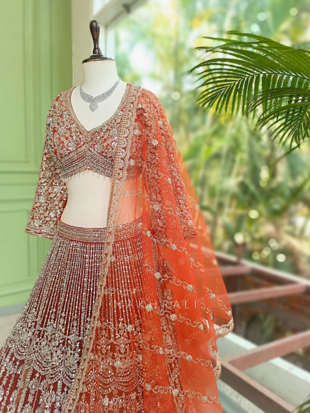 Selene Orange  Bridal Lehenga with Silver Embroidery