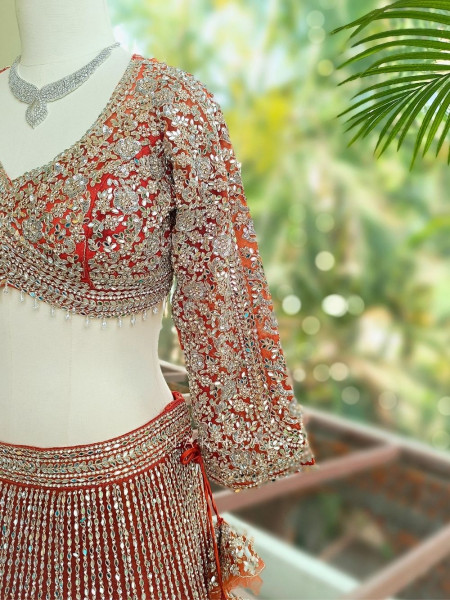 Selene Orange  Bridal Lehenga with Silver Embroidery