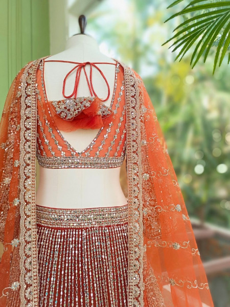 Selene Orange  Bridal Lehenga with Silver Embroidery