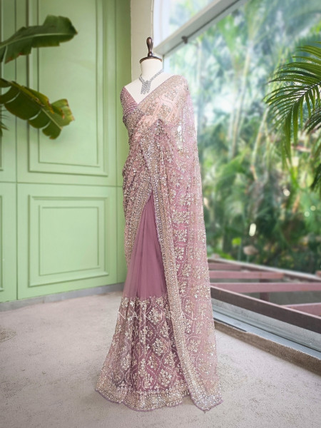 Tarangini Light Purple Net Saree With Cutdana and Sequin Work