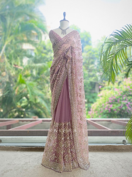 Tarangini Light Purple Net Saree With Cutdana and Sequin Work