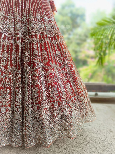 Selene Orange  Bridal Lehenga with Silver Embroidery