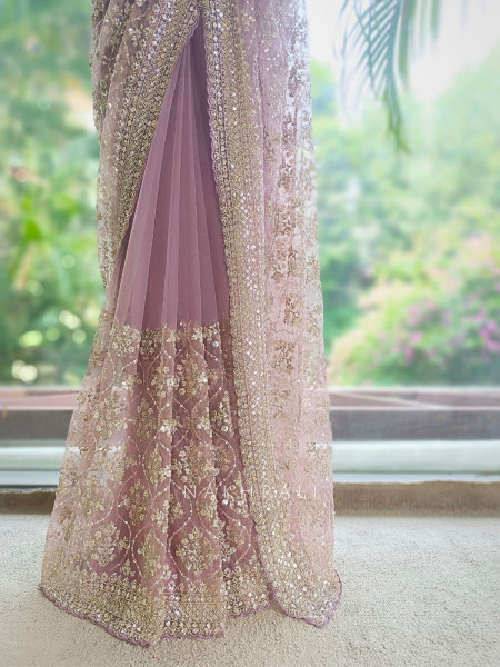 Tarangini Light Purple Net Saree With Cutdana and Sequin Work
