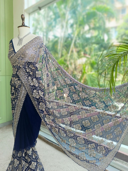 Tarangini Blue Net Saree With Cutdana and Sequin Work