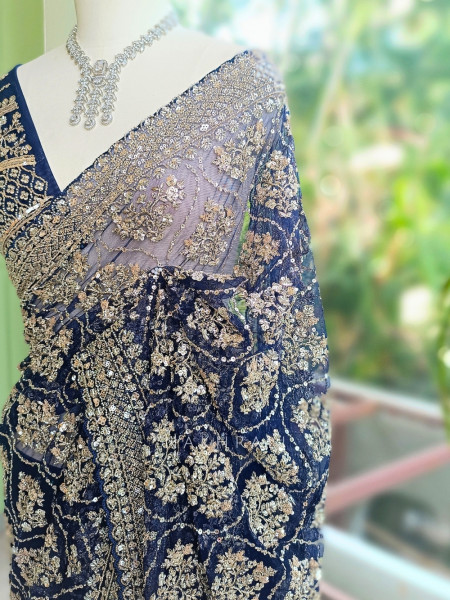 Tarangini Blue Net Saree With Cutdana and Sequin Work