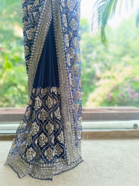 Tarangini Blue Net Saree With Cutdana and Sequin Work