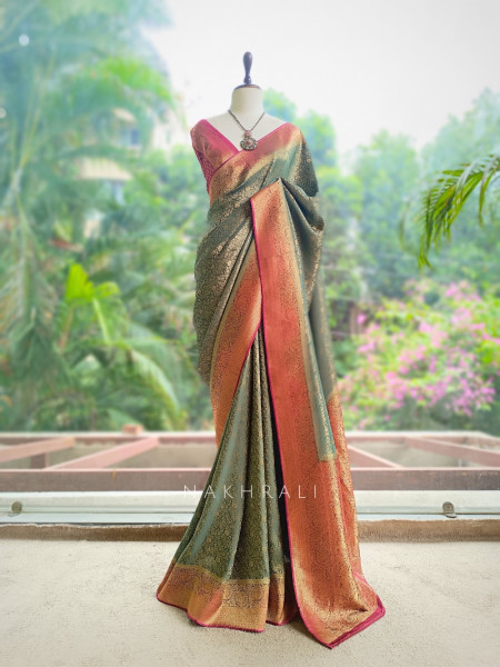 Tantushri Teal Green Saree With Woven Motifs and Contrast Border