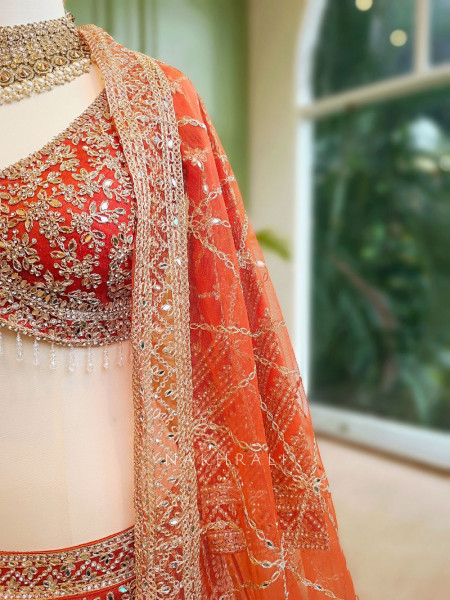 Kaira Orange Mirror Work Silk Lehenga