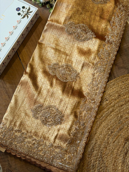 Trivana  Golden Brocade Saree with Cut Dana and Sequin Work