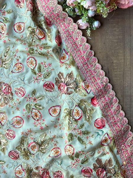 Nirvitha Pista Green Saree with Printed Embroidery and Sequin Work